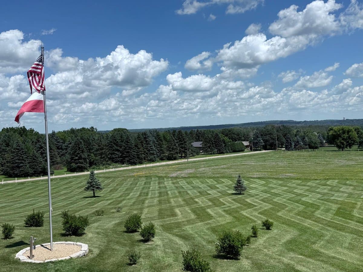 Striped lawn on a large property